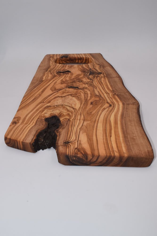 Chopping board with small handle in olive wood