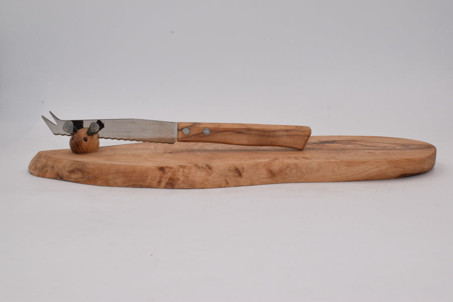 Rustic chopping board with mouse in olive wood
