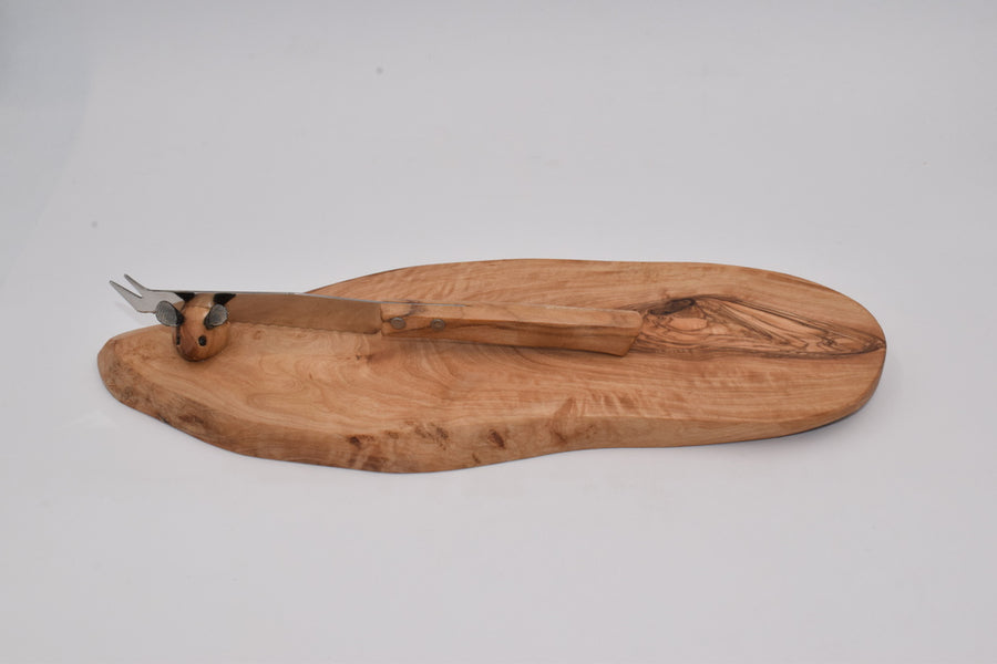 Rustic chopping board with mouse in olive wood